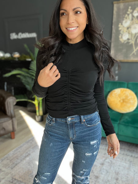 Black mock neck top
